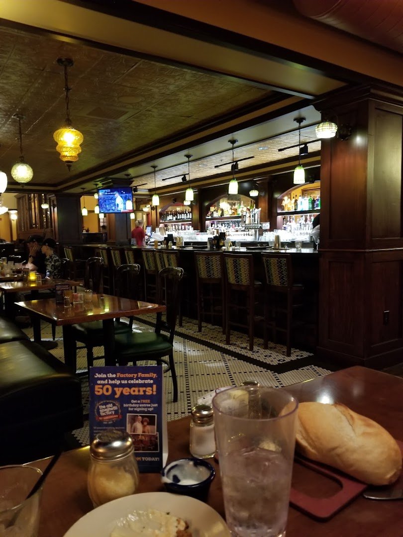Pub tables with beer glasses and casual seating.